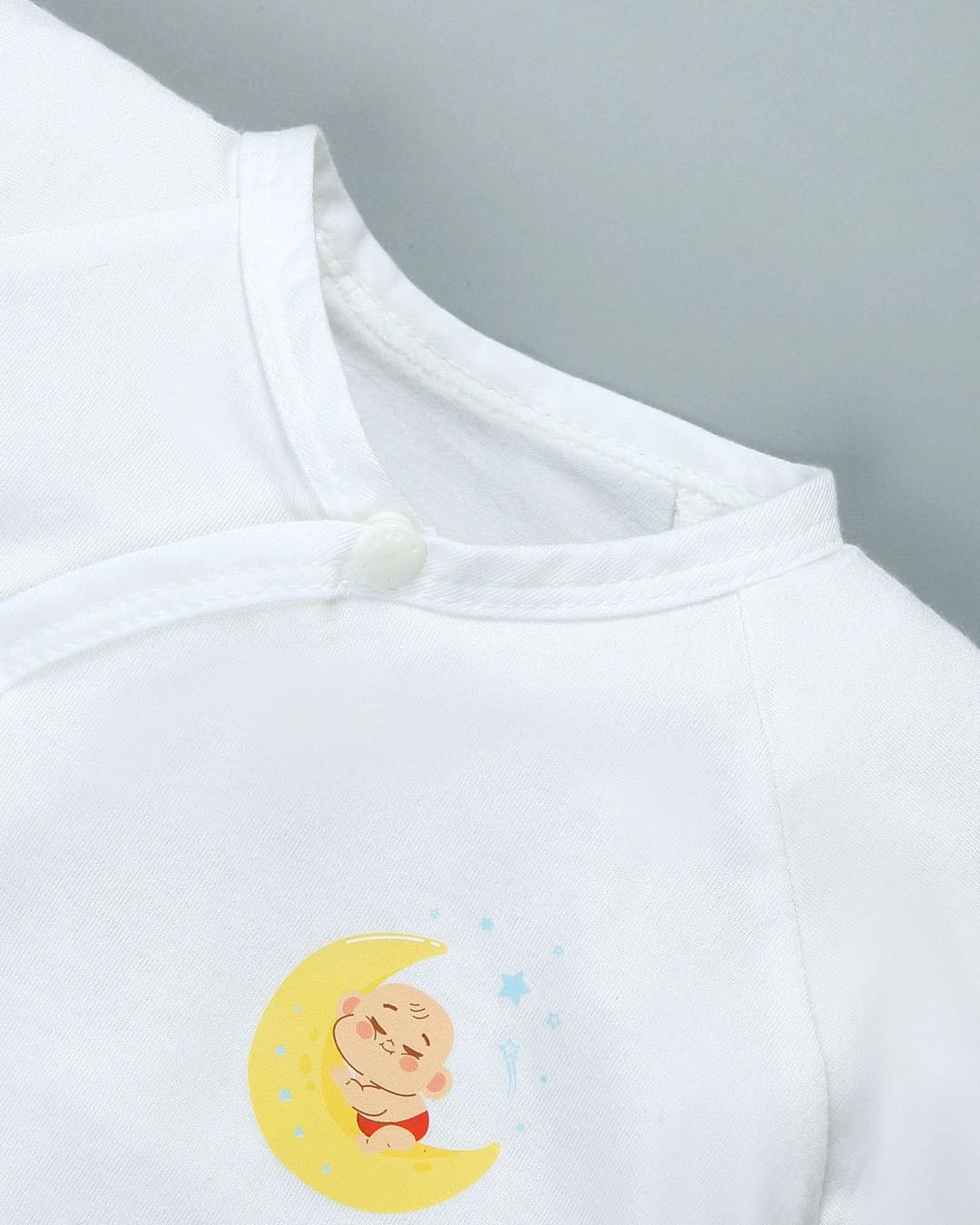 Combo 2 áo tay dài in cá heo xanh và em bé IQ Baby màu trắng 10