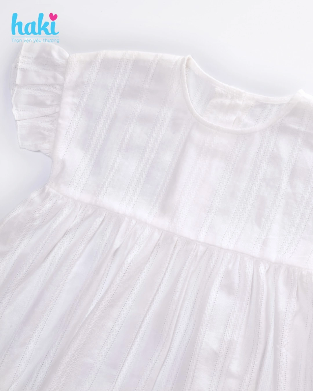 Đầm bé gái Haki màu trắng vai tay quấn bèo 2