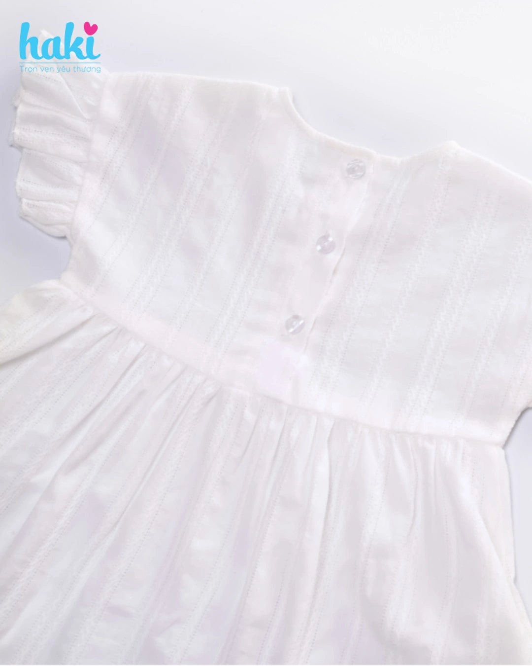Đầm bé gái Haki màu trắng vai tay quấn bèo 3