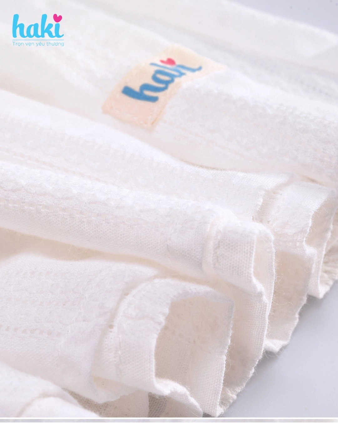 Đầm bé gái Haki màu trắng vai tay quấn bèo 4