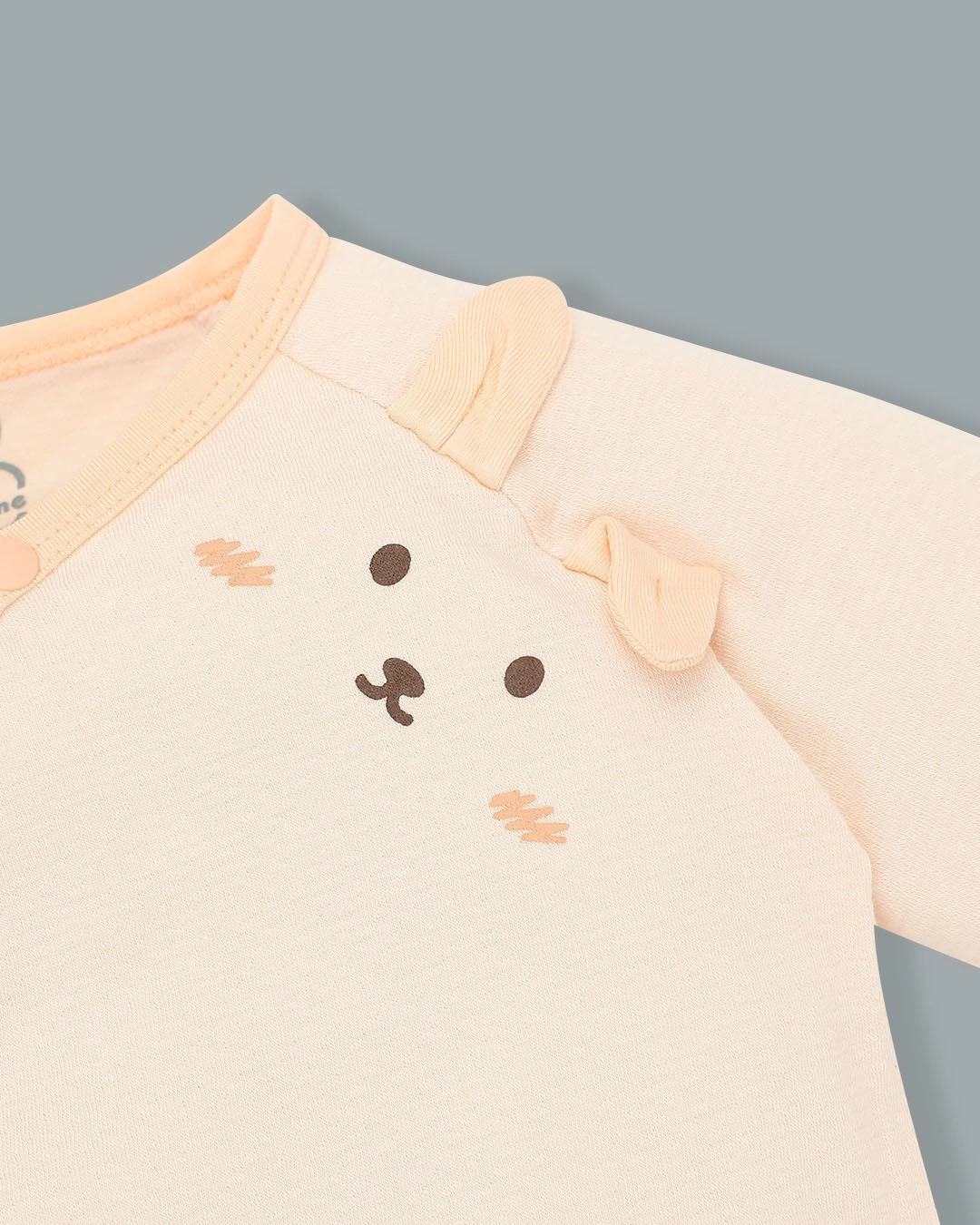 Bodysuit cài chéo tai thỏ xinh xắn La Pomme màu be 9