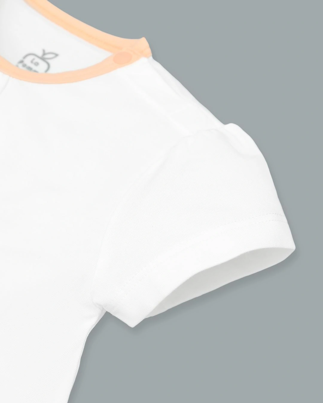 Bodysuit tay ngắn bèo nhún La Pomme màu trắng - cam 4