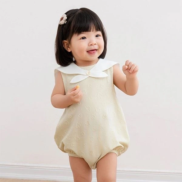 Bodysuit bé gái cổ cách điệu La Pomme màu be 1