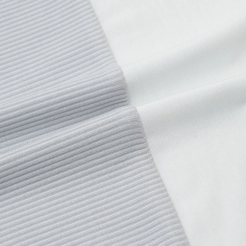 Bodysuit tay ngắn La Pomme giả yếm cún bông lém lỉnh màu trắng xám 9