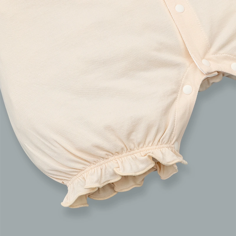 Bodysuit tay ngắn La Pomme kèm nơ dây yếm điệu đà màu hồng kem 8