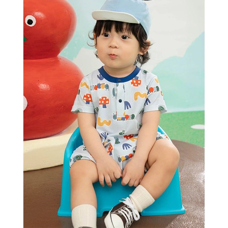 Bodysuit tay ngắn La Pomme họa tiết những người bạn trong vườn màu xanh nhạt 2