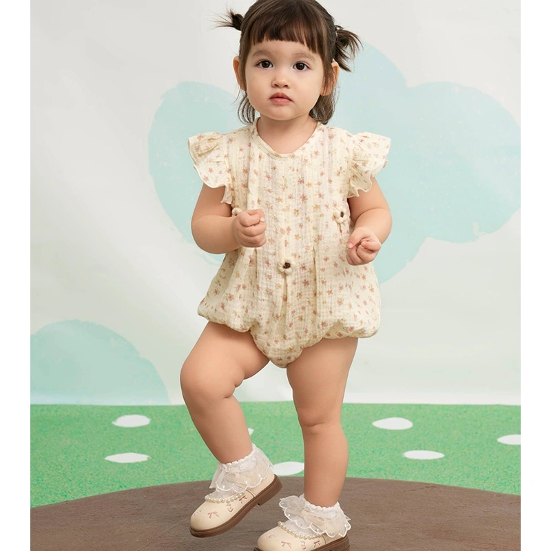 Bodysuit tay ngắn La Pomme hoạ tiết vườn hoa nhí màu kem 2