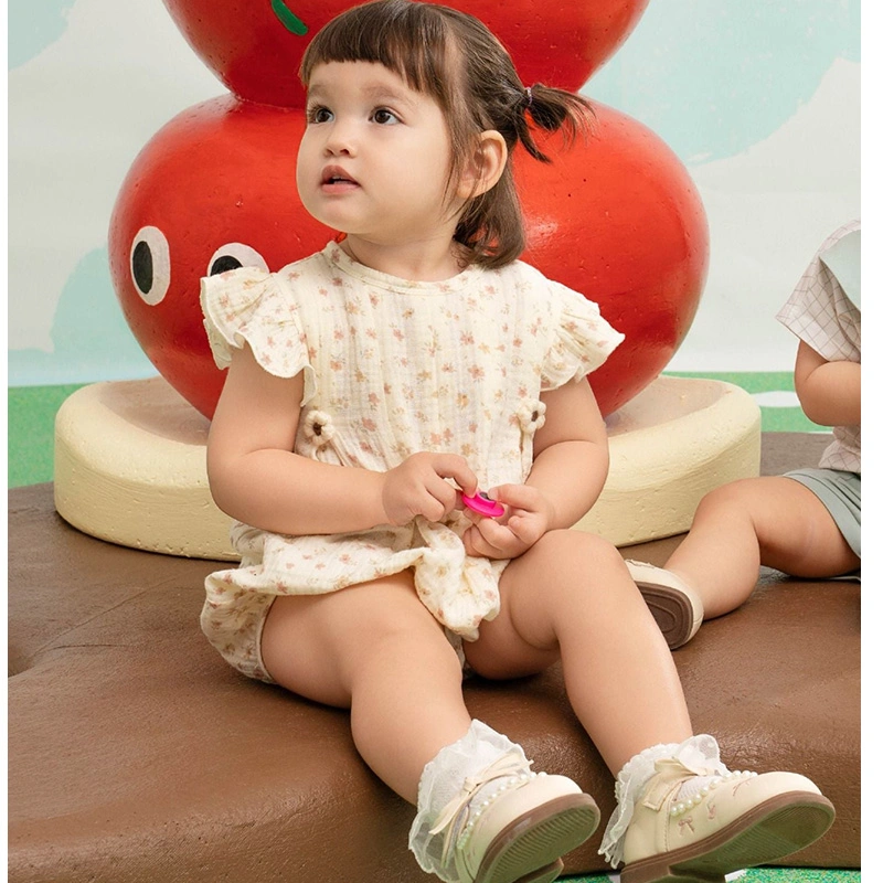 Bodysuit tay ngắn La Pomme hoạ tiết vườn hoa nhí màu kem 3