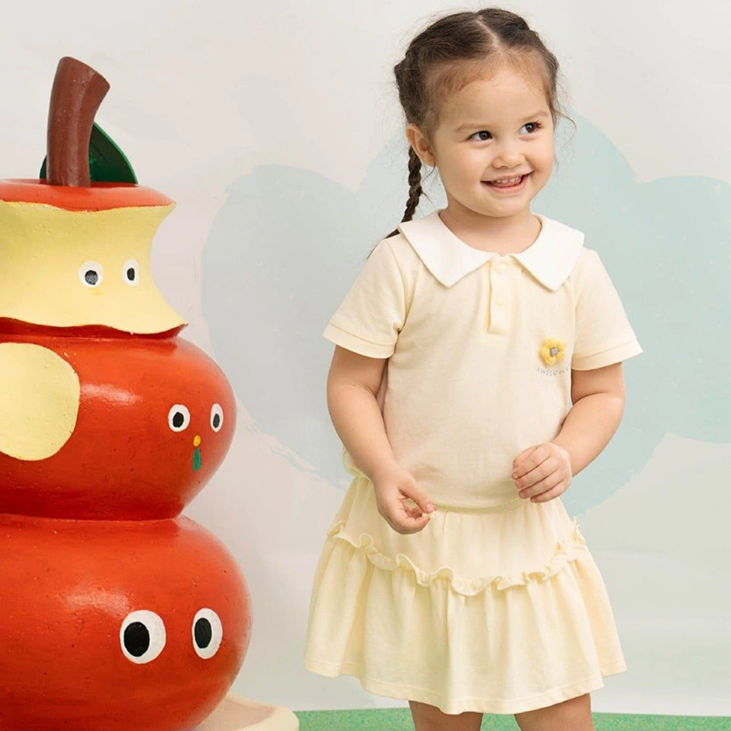 Set váy bé gái La Pomme nhún li cách điệu màu vàng nhạt 3