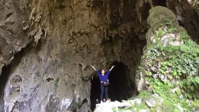 Tourists visit A ​​Phu cave