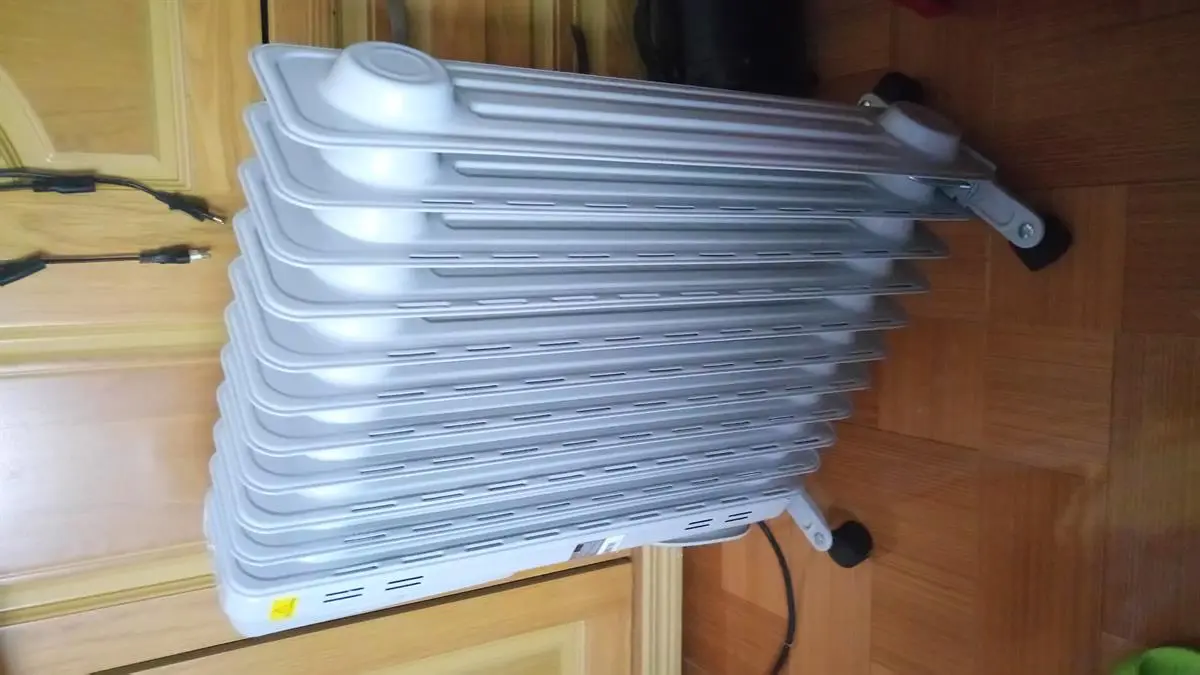 Khách hàng review Quạt sưởi dầu Midea MH-O23-11A 1