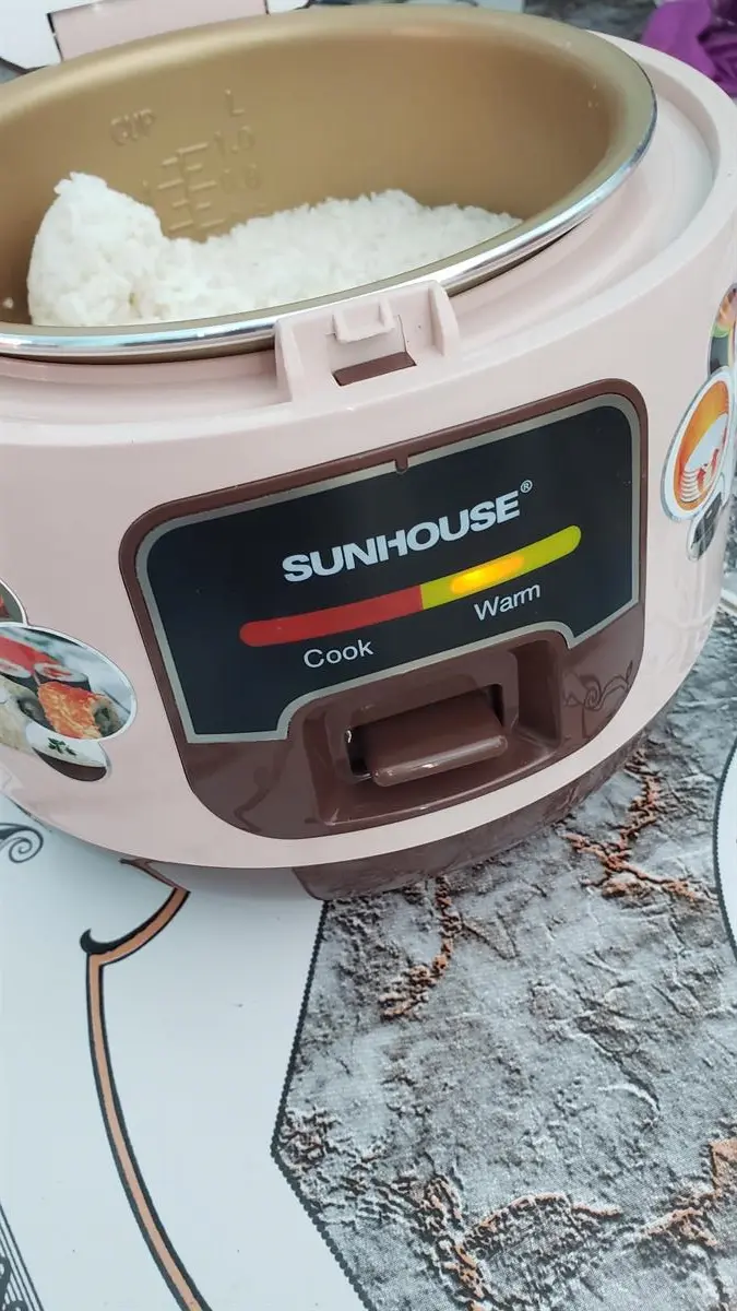 Khách hàng review Nồi cơm nắp gài Sunhouse 1 lít SHD8208C 15