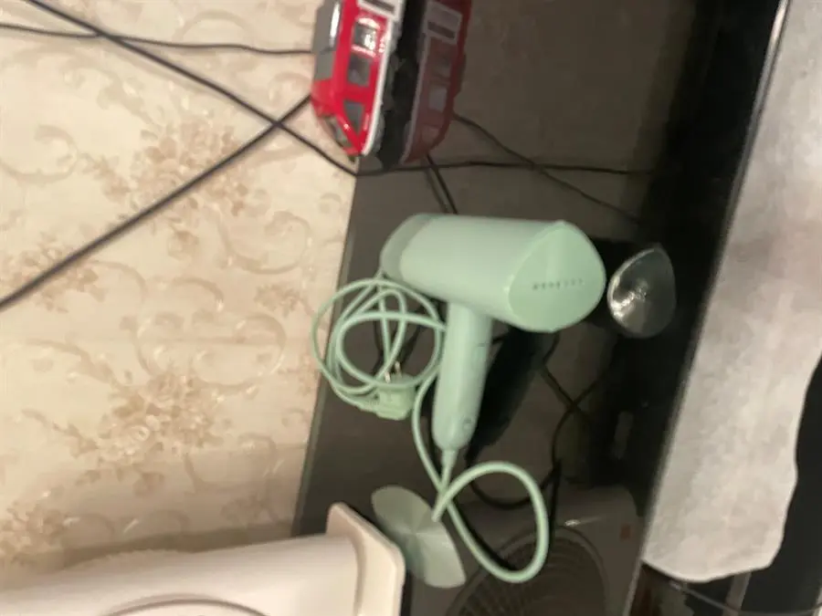 Khách hàng review Bàn ủi hơi nước cầm tay Philips STH3010 1090W 11