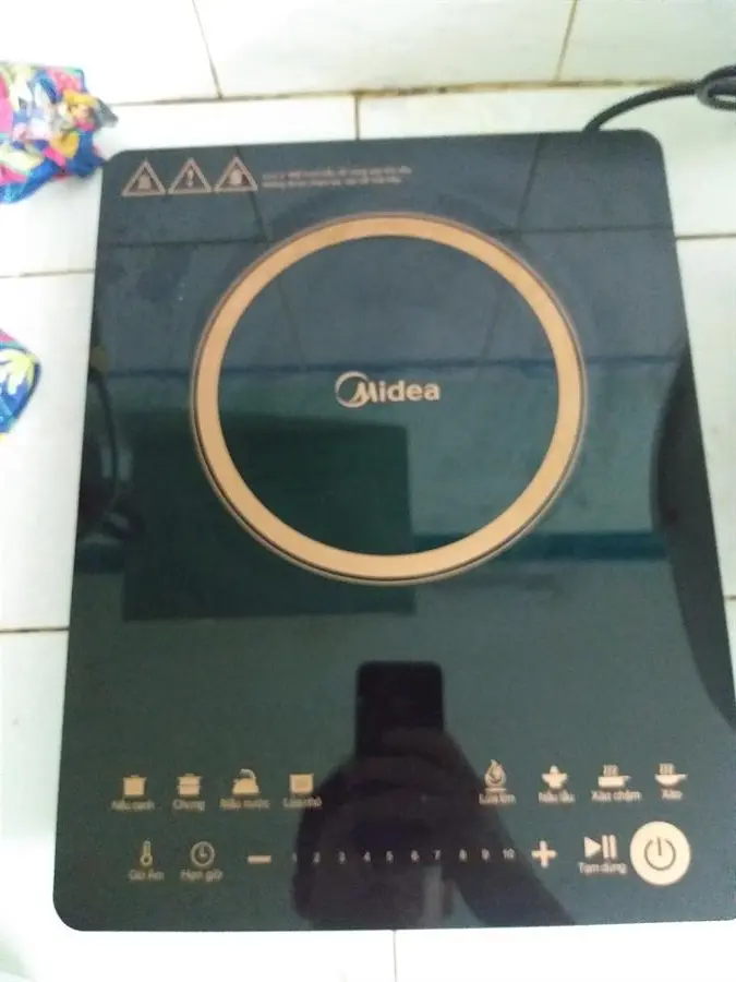 Khách hàng review Bếp từ Midea MI-T2120DC 3