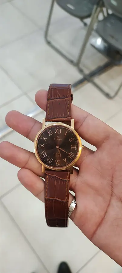 Khách hàng review Đồng hồ TITAN 37.4 mm Nam 1595WL03 4