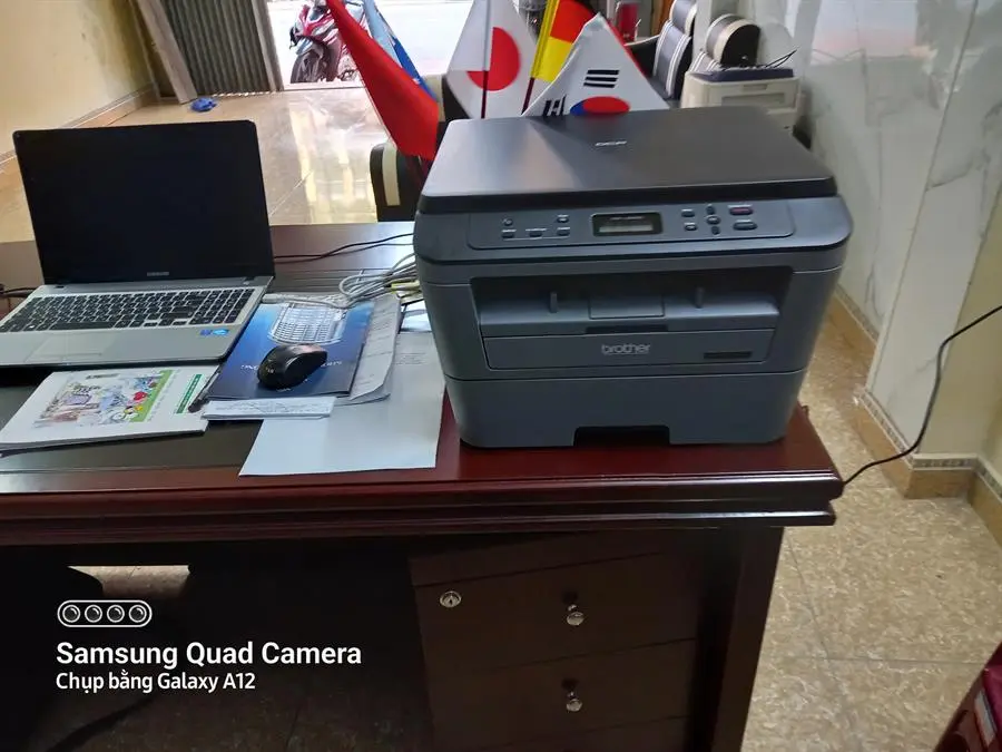 Khách hàng review Máy in laser trắng đen đa năng Brother DCP-L2520D 5