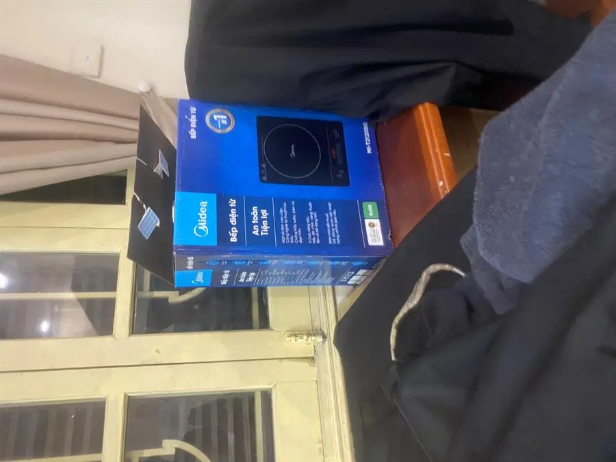 Khách hàng review Bếp từ Midea MI-T2120DG 2