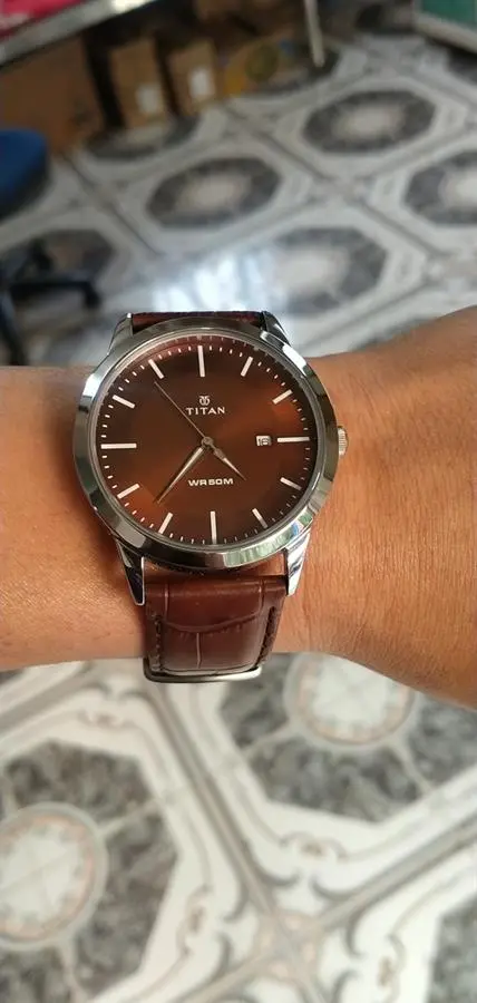 Khách hàng review Đồng hồ TITAN 42 mm Nam 1584SL04 4