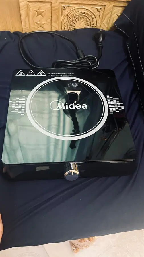 Khách hàng review Bếp từ Midea MI-K1917EF Đen 9