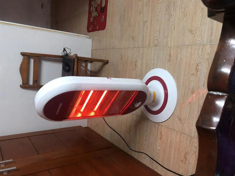 Khách hàng review Quạt sưởi hồng ngoại Sunhouse SHD7022 4