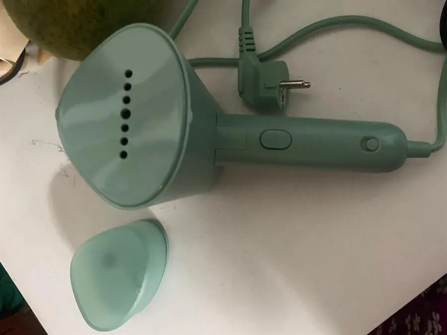 Khách hàng review Bàn ủi hơi nước cầm tay Philips STH3010 1090W 6