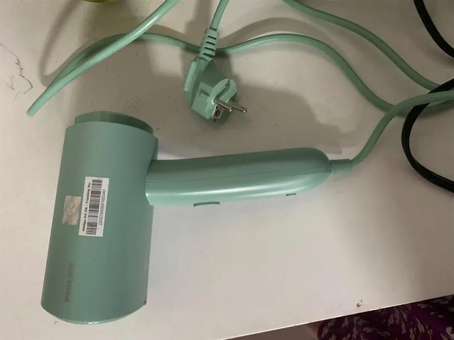 Khách hàng review Bàn ủi hơi nước cầm tay Philips STH3010 1090W 4