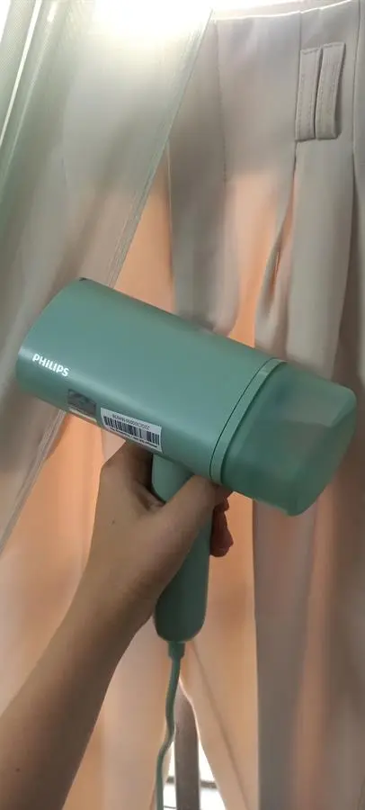 Khách hàng review Bàn ủi hơi nước cầm tay Philips STH3010 1090W 2