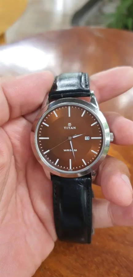 Khách hàng review Đồng hồ TITAN 42 mm Nam 1584SL04 3