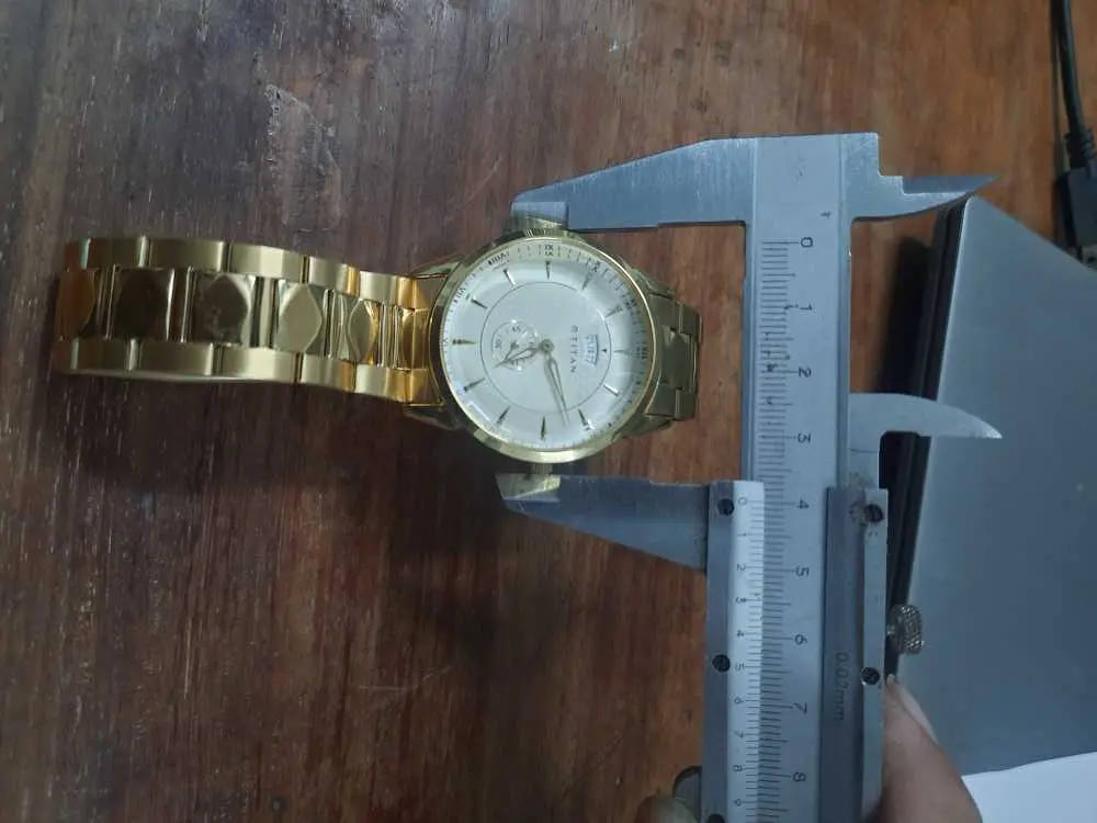 Khách hàng review Đồng hồ TITAN 35 mm Nam 1521YM02 2