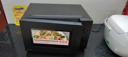 Khách hàng review Lò vi sóng Panasonic NN-SM33NBYUE 25 lít 1