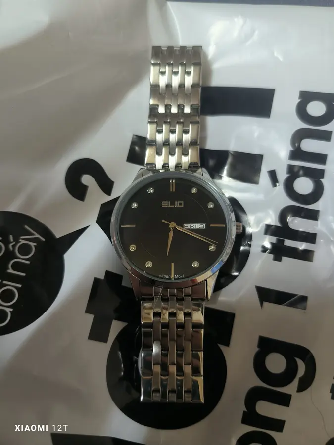 Khách hàng review Đồng hồ ELIO 39 mm Nam EC004-01 1