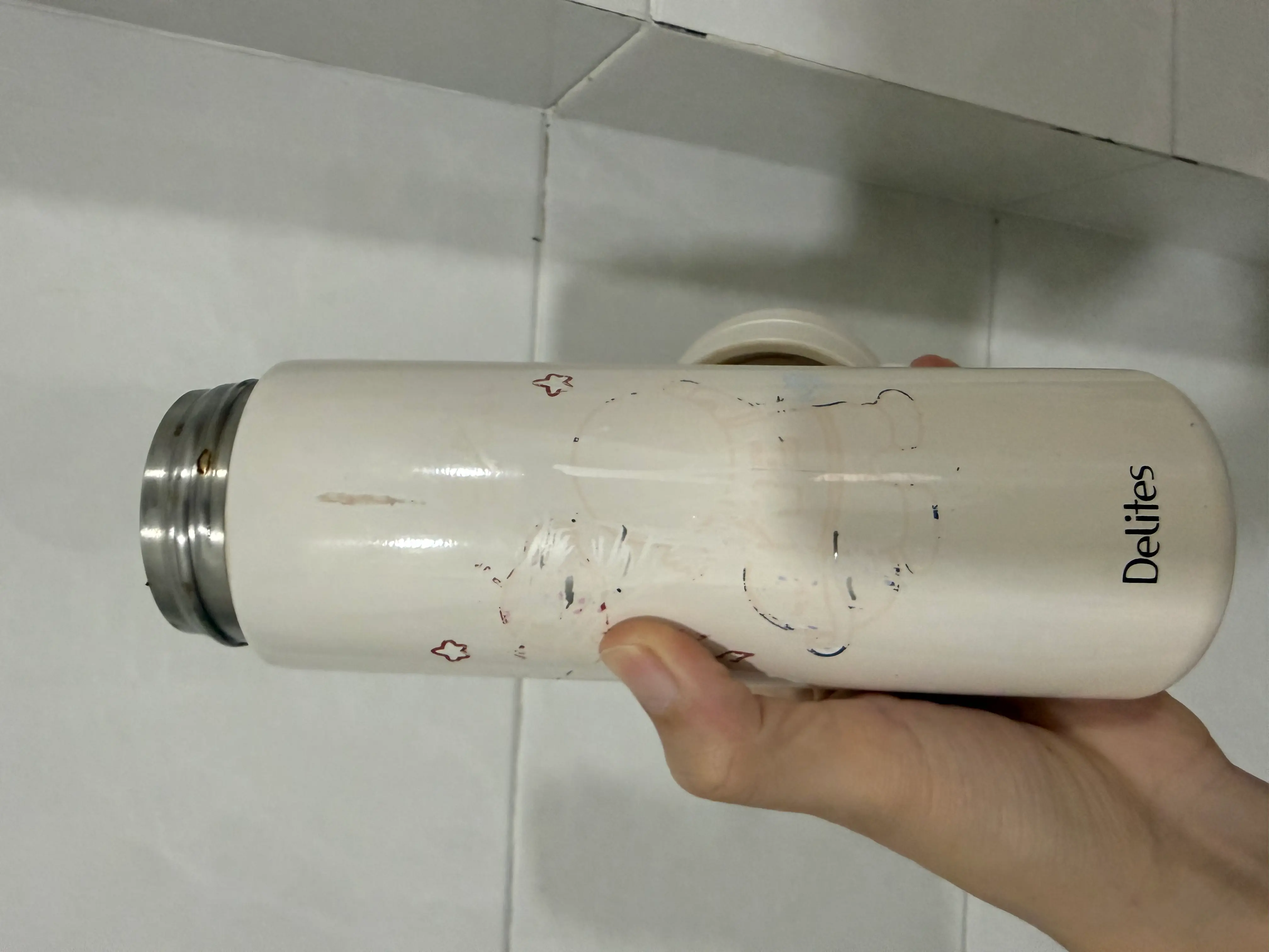 Khách hàng review Bình giữ nhiệt inox 450 ml Delites TH05021 trắng 2